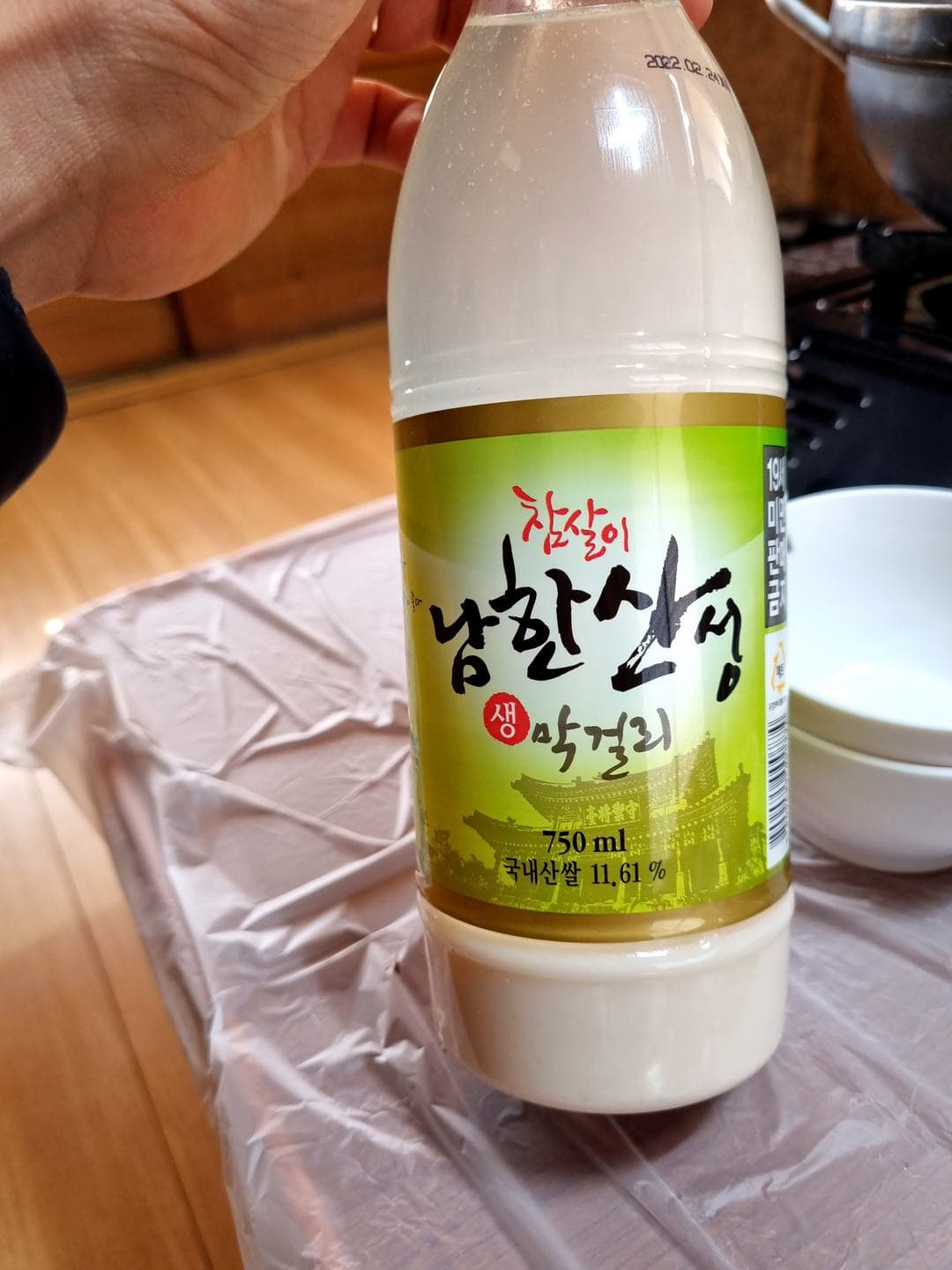 A bottle of Namhansanseong makgeolli on the table