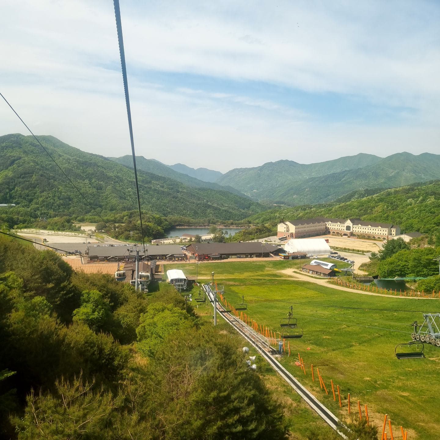 The resort and its slopes far below, seen from the gondola