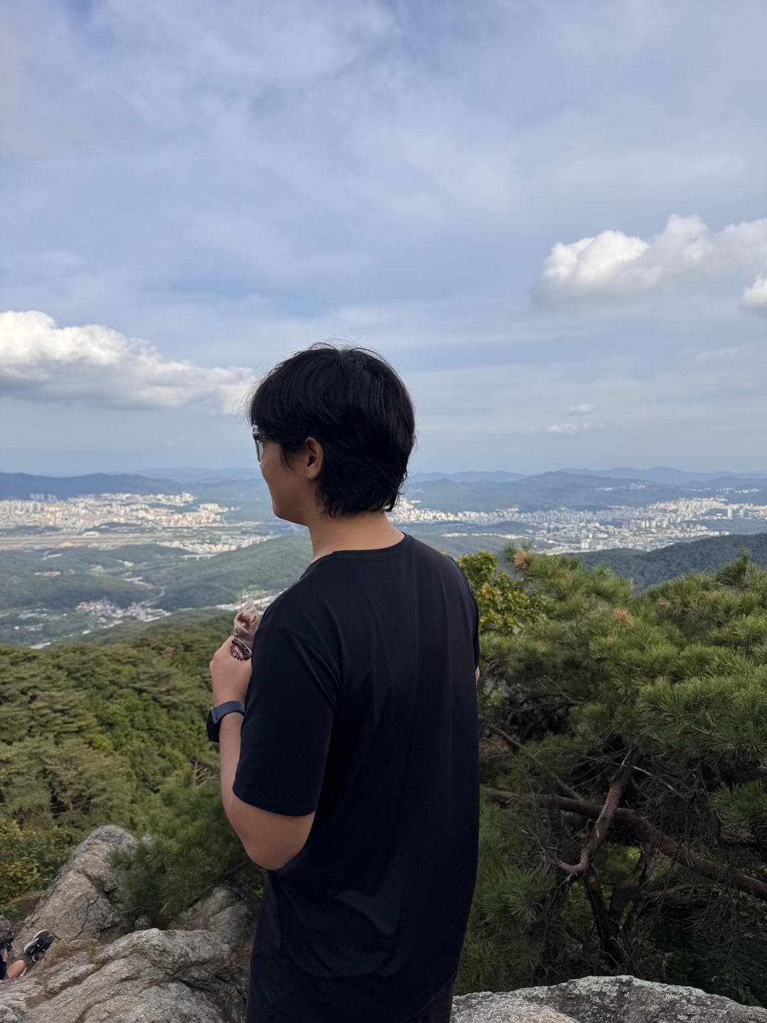 Looking out over the city from the rocks